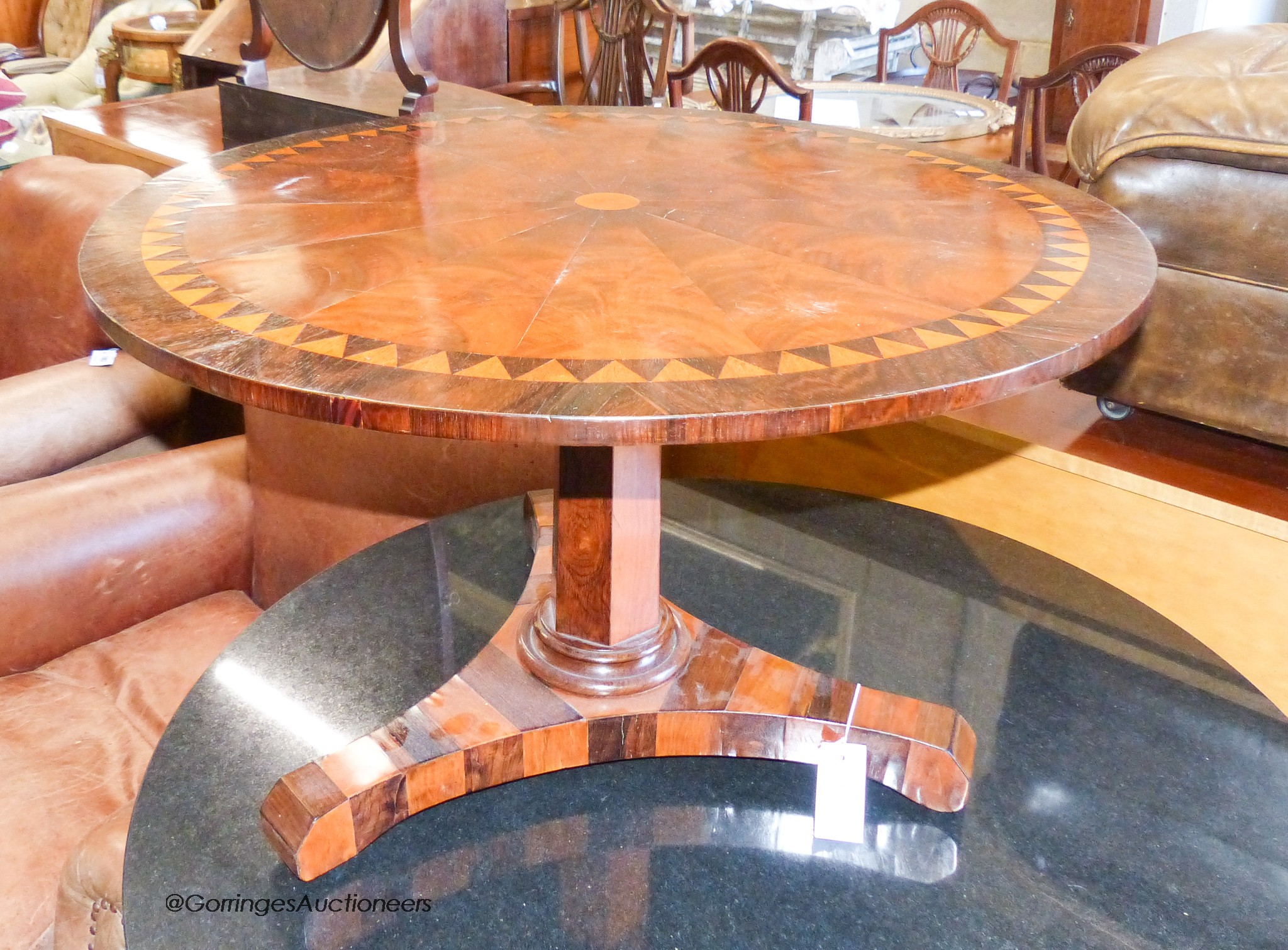A 19th century circular parquetry low table (cut down), diameter 74cm, height 45cm